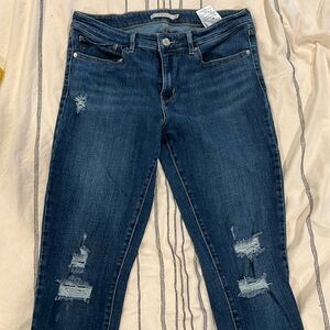 Levi 711 skinny distressed jeans
